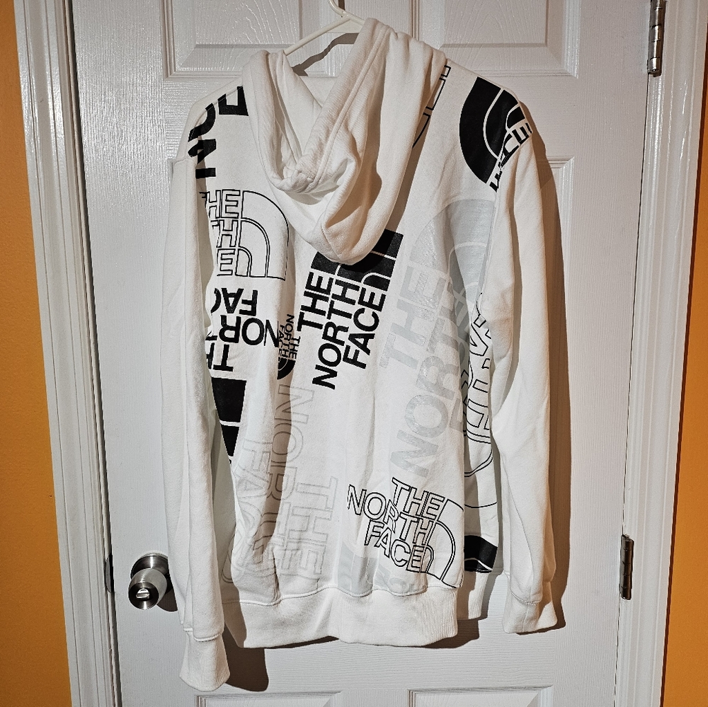 The North Face Hoodie. Mens size LG. All over print on back. EUC